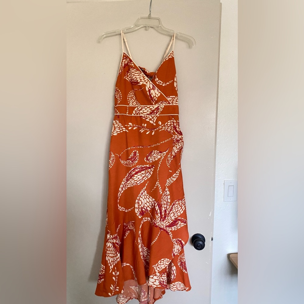 Orange printed wrap style dress